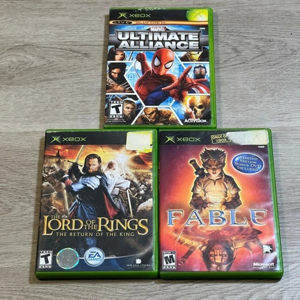 Microsoft Xbox Video Game Lot 3 Games Marvel Ultimate Alliance Fable LOTR Return
